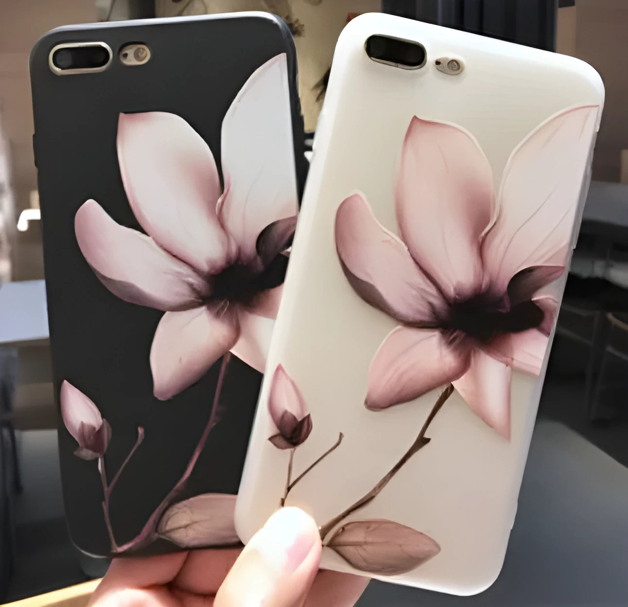Embossed floral design on a black TPU iPhone case for iPhone 11.