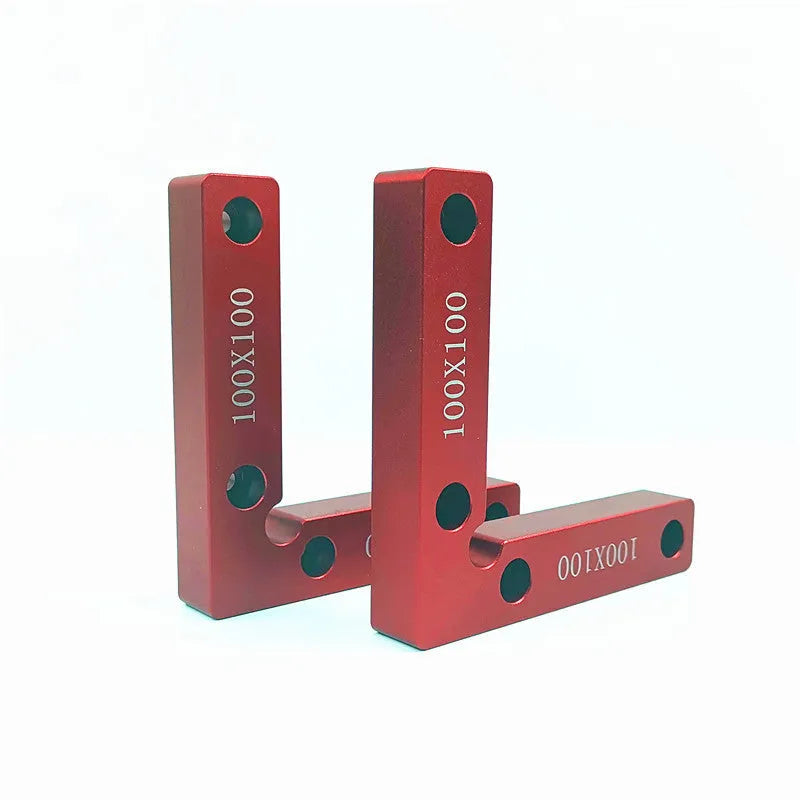 Aluminium woodworking right angle positioning block with scale, shown next to a jigsaw.