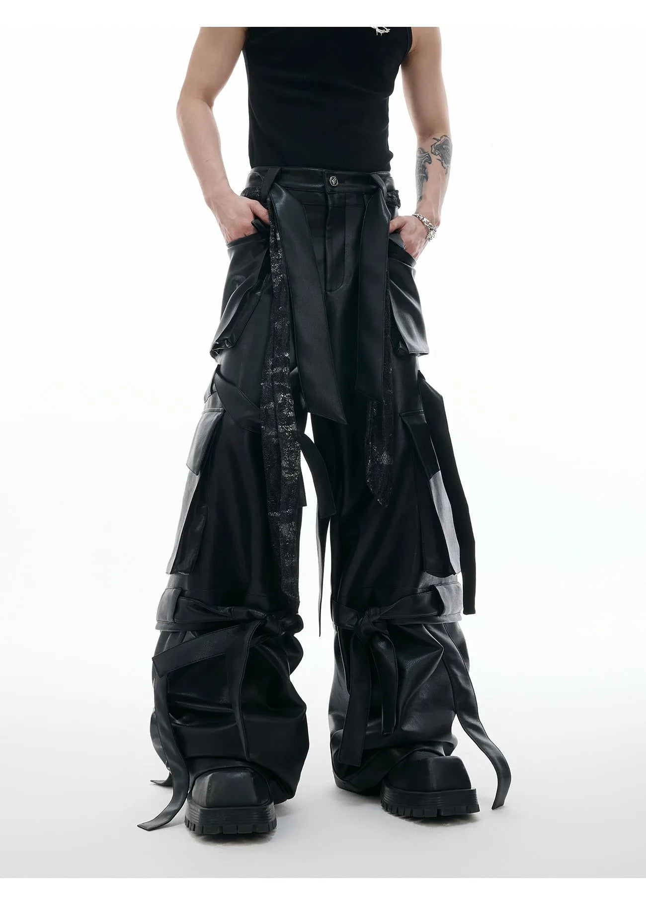 Black loose-fit retro pants with quilted stitching and multiple pockets on a model