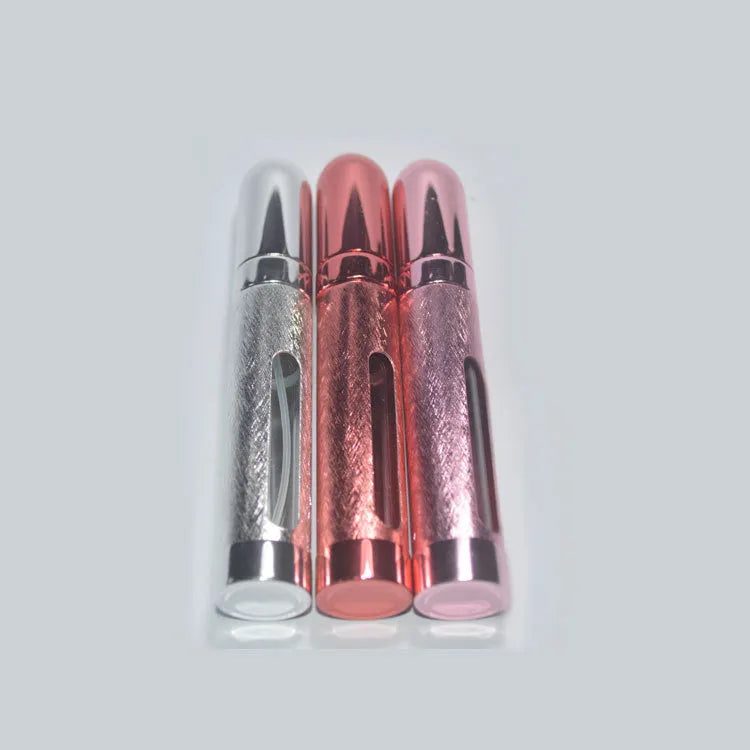 12ml aluminium portable perfume bottle in bullet shape with glass liner, shown in six colour options.