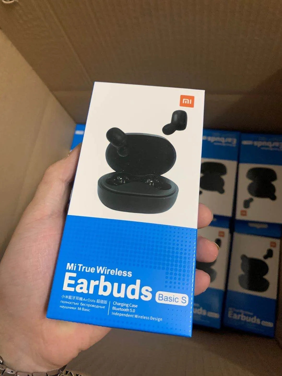 Redmi AirDots 2 true wireless black earbuds with a charging case.