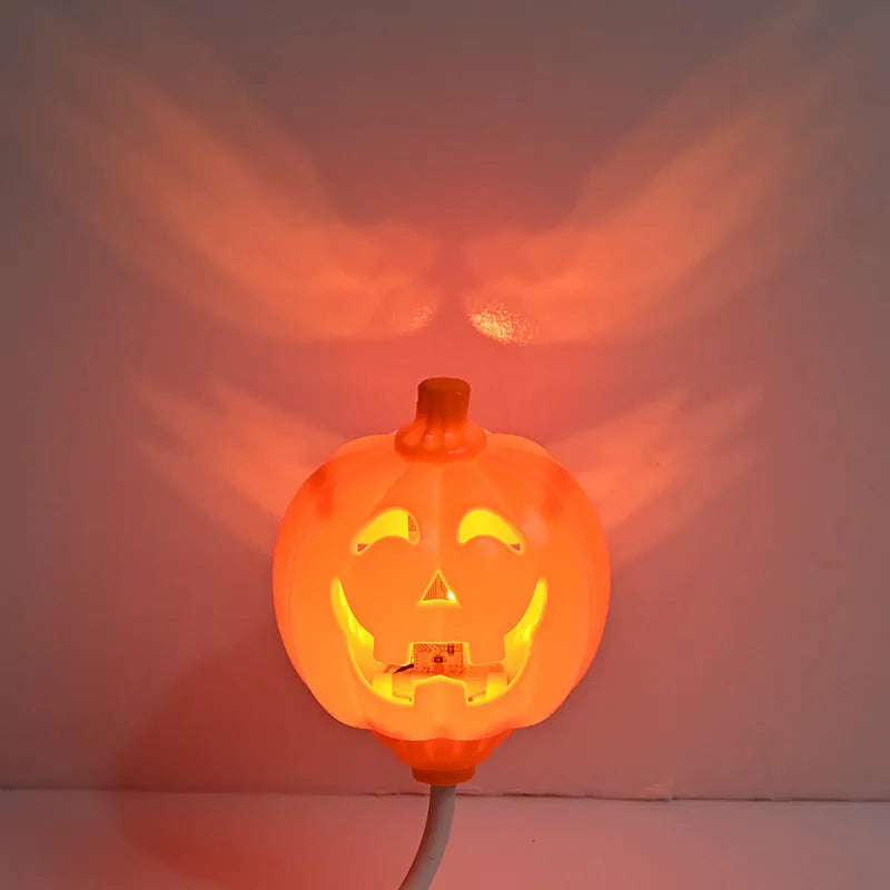 Plastic pumpkin decorative lamp with USB charging port in yellow or purple light options