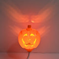 Plastic pumpkin decorative lamp with USB charging port in yellow or purple light options