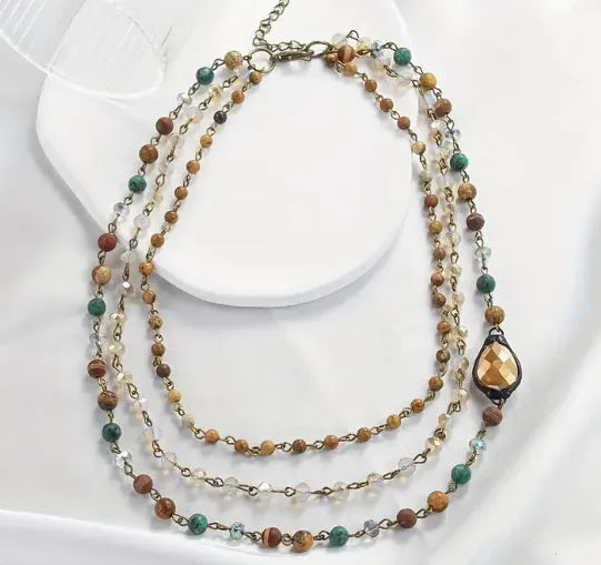 Handmade bohemian multi-layer necklace with natural stone and glass drop-shaped beads in blue-green colour