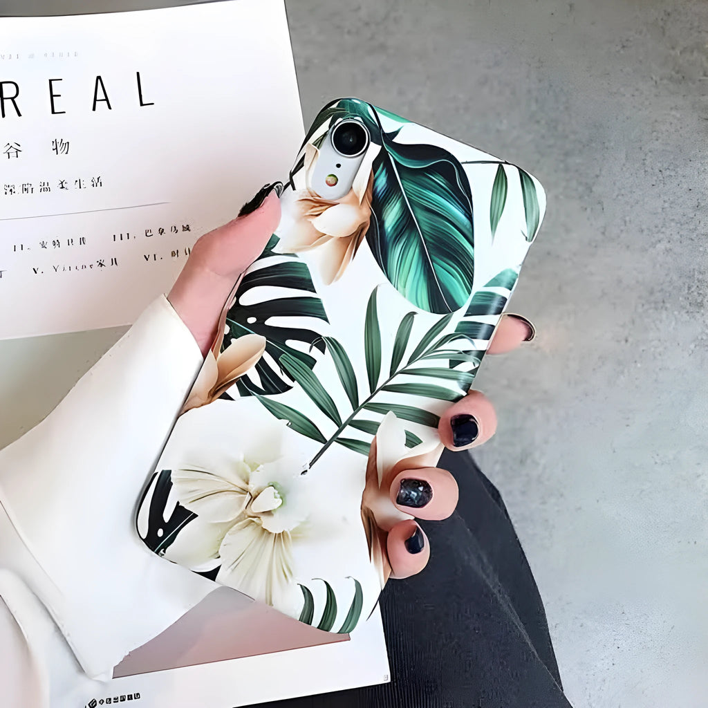 Floral banana leaf art design on a soft TPU phone case for iPhone models.