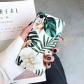 Floral banana leaf art design on a soft TPU phone case for iPhone models.