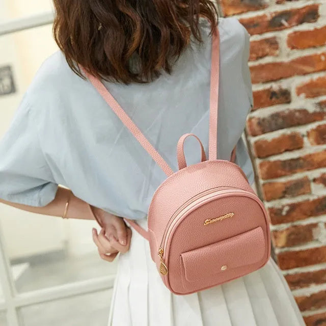 Women small solid colour PU backpack with zip closure for mobile phone and student travel use