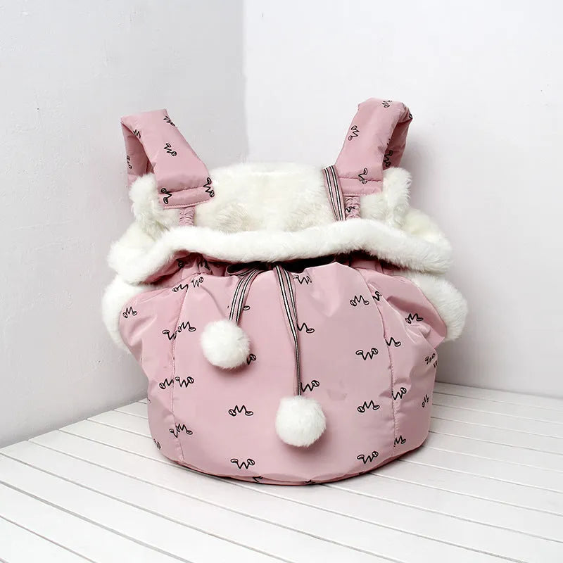 Winter pet carrier backpack in blue and pink made of soft flannel for cats and dogs