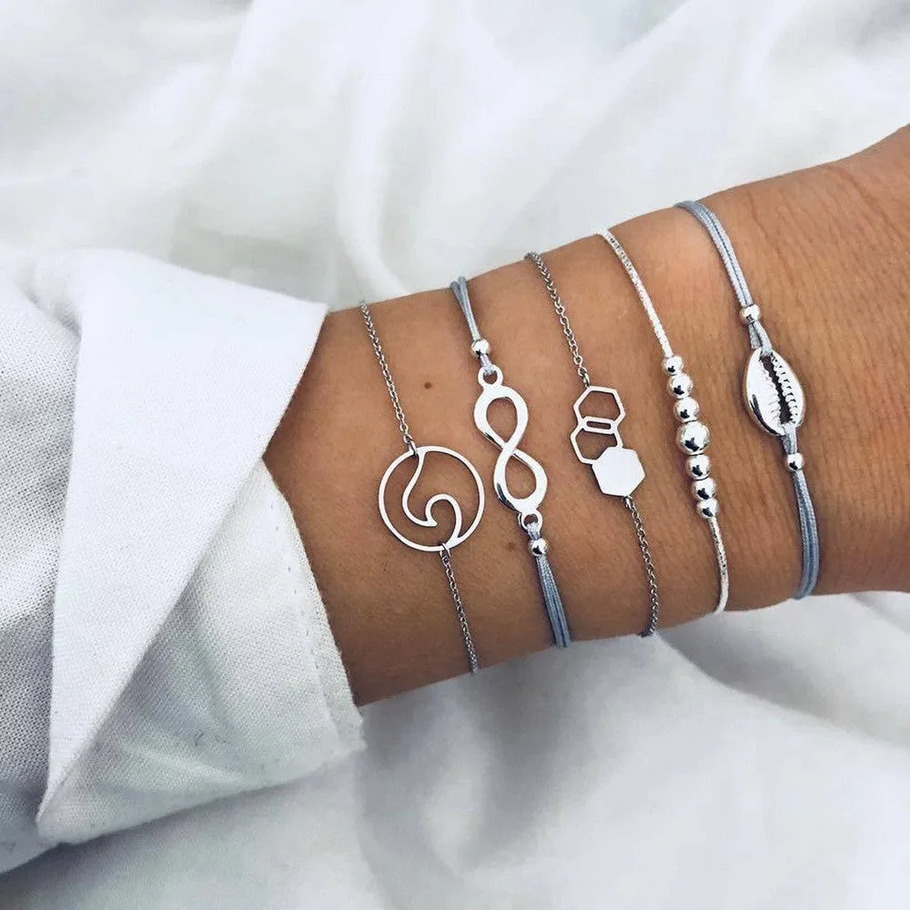 Bohemian bracelet set with alloy vintage bead and boho charm design in bow love style for women
