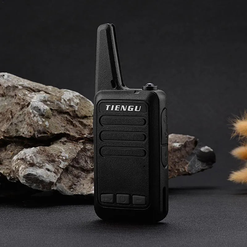 TIENGU Wireless Handheld Radio Intercom in black, showing LED flashlight and back clip on solid background