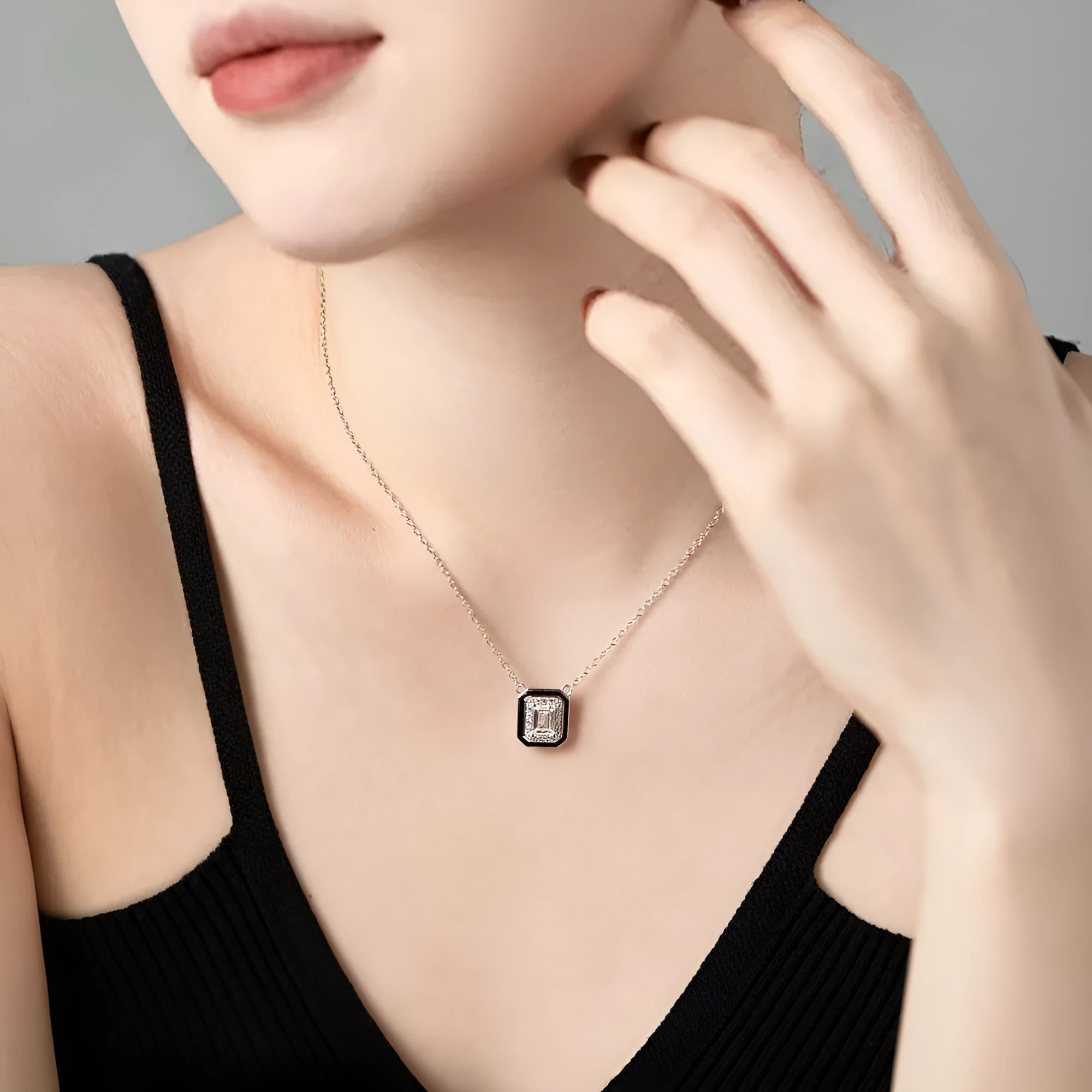 Women's 925 silver rectangular zircon fashion necklace with blue stone pendant on white background
