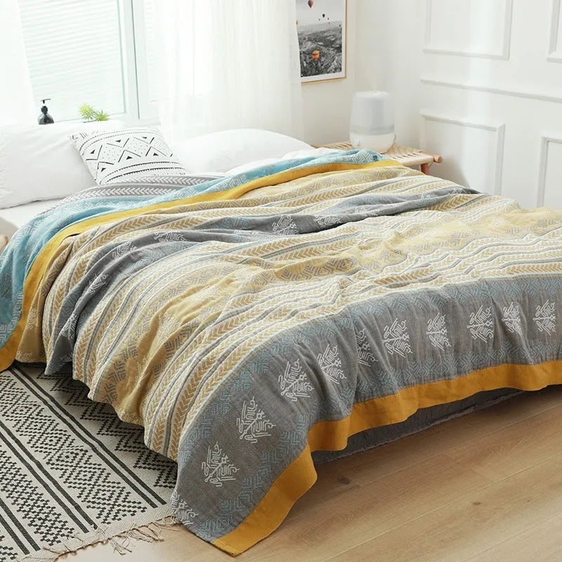 Five-layer cotton gauze bed blanket with Roulette Wheel Blue pattern showing modern simplicity design