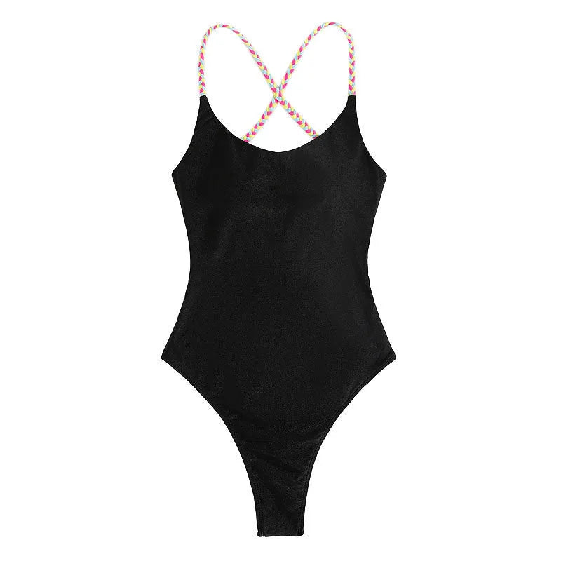 Black backless sleeveless one-piece swimsuit laid flat.