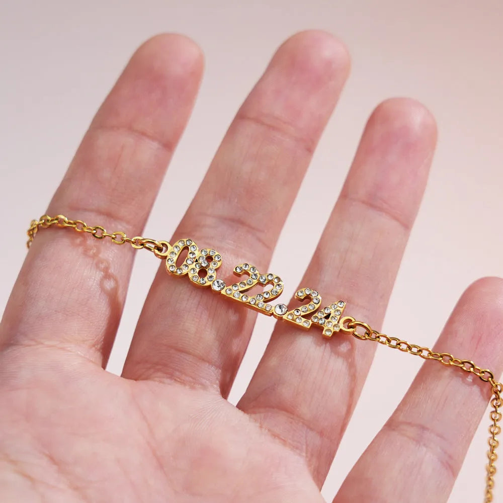 Stainless steel digital bracelet and necklace set with decorative stones in gold, rose gold, or steel colour