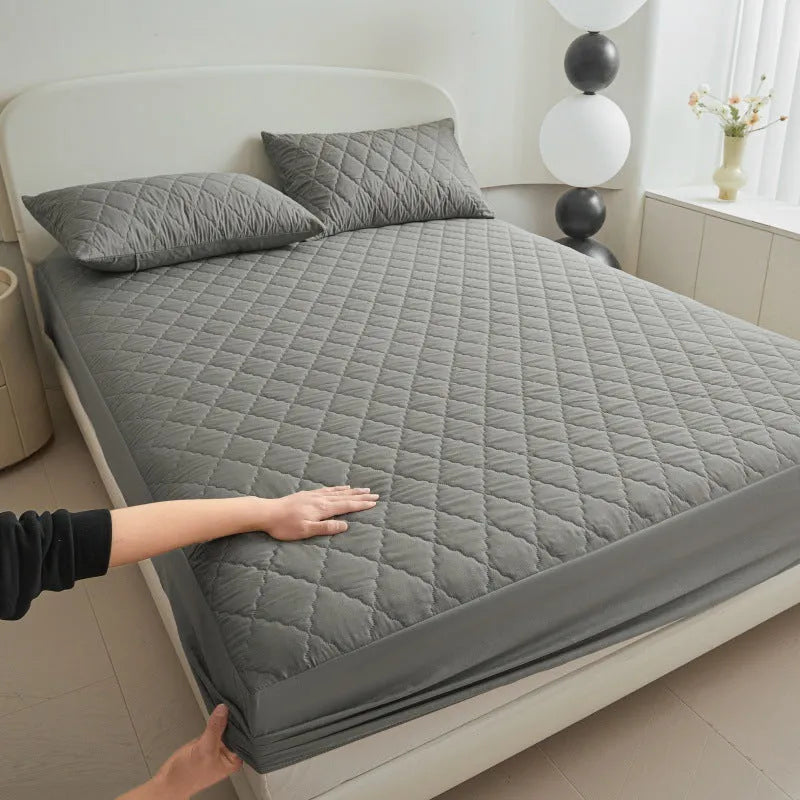 Diamond lattice quilted waterproof mattress protector set with fitted sheet and pillowcases in bamboo fibre