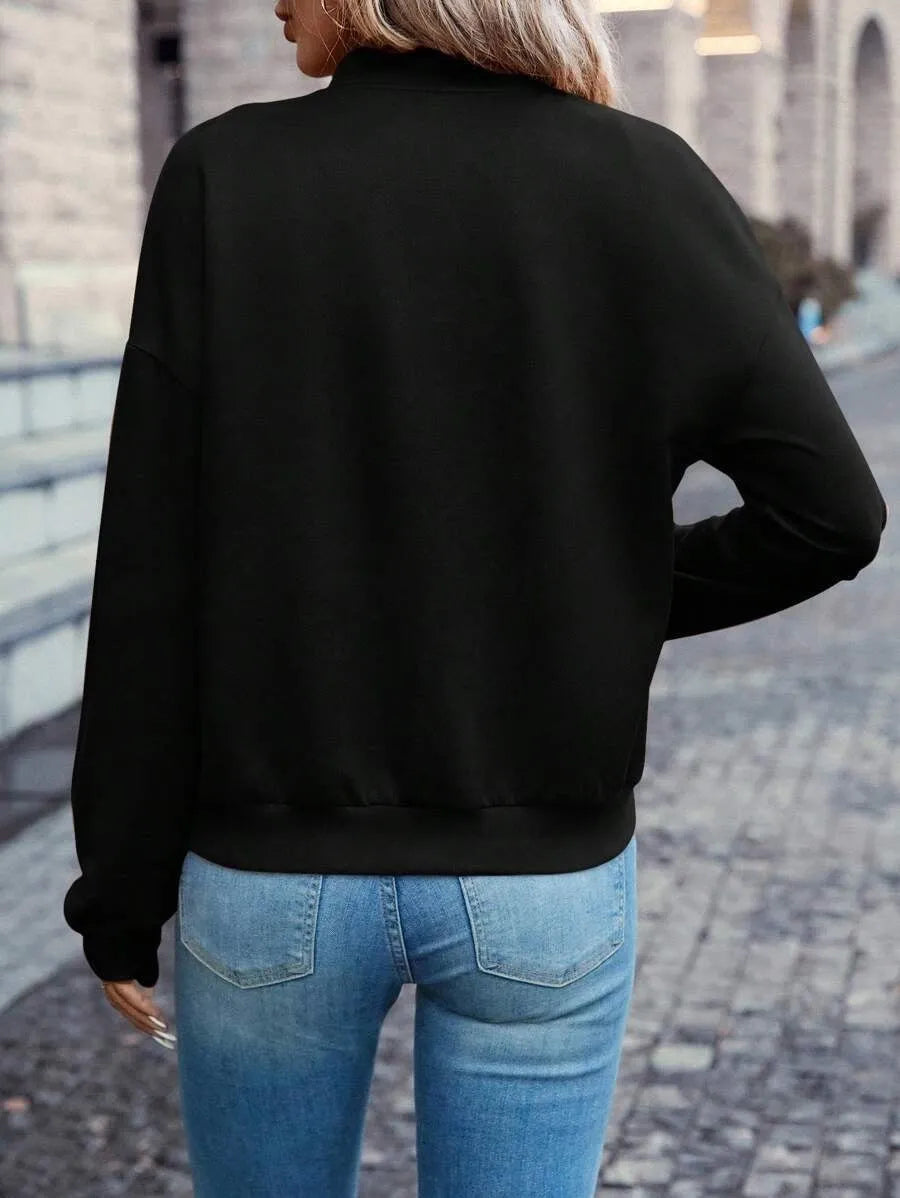 Black women's casual zip-front jacket with long sleeves for autumn and winter.
