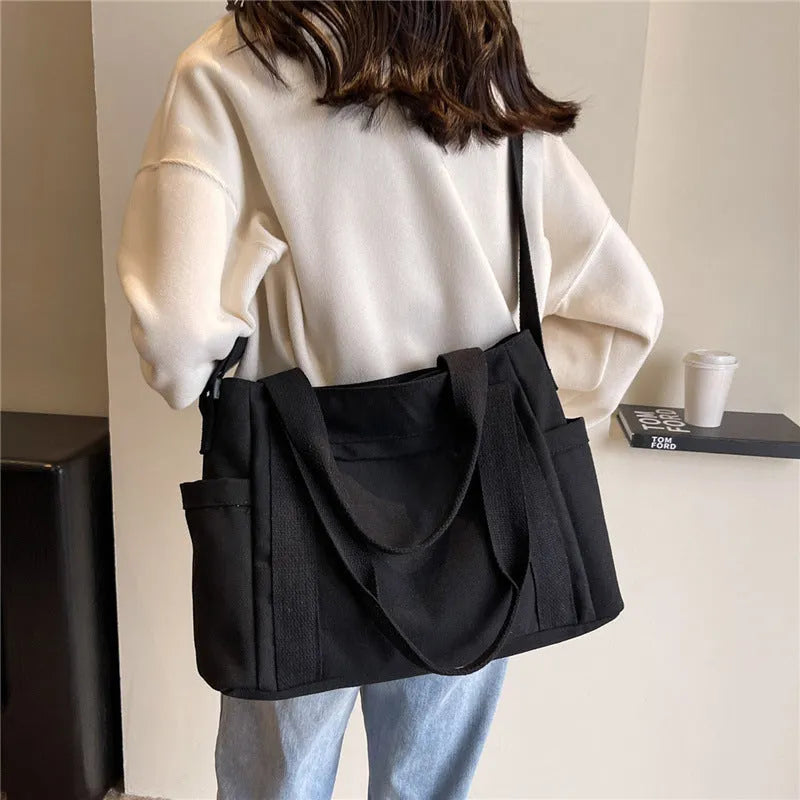 Large capacity polyester canvas shoulder tote bag in solid colour with phone compartment