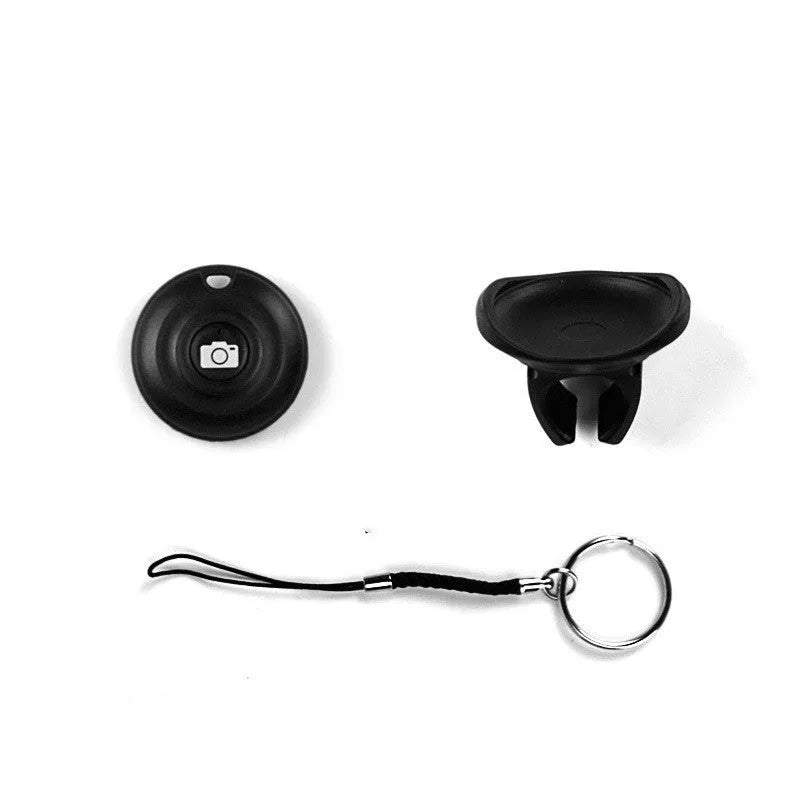 Black Bluetooth remote shutter control for smartphone photography with 10+ metre wireless range.