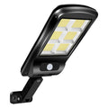 Black solar-powered outdoor wall light with motion sensor for garden and driveway security.