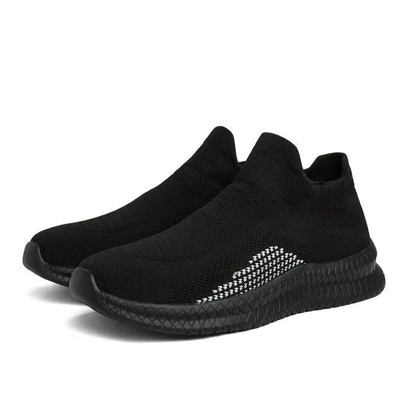 Popcorn Flyknit fabric low-top casual sneaker in white, black, or blue with a flat heel.