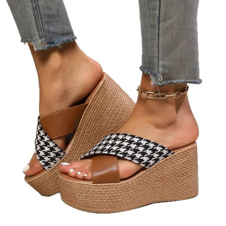 Cross leopard plaid wedge sandals in brown and black patterns with rubber sole and plastic upper
