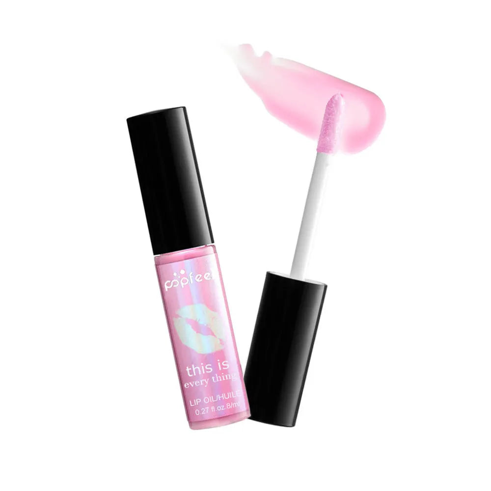 Transparent lip gloss in tube, nourishing multivitamin formula, available in four colours.