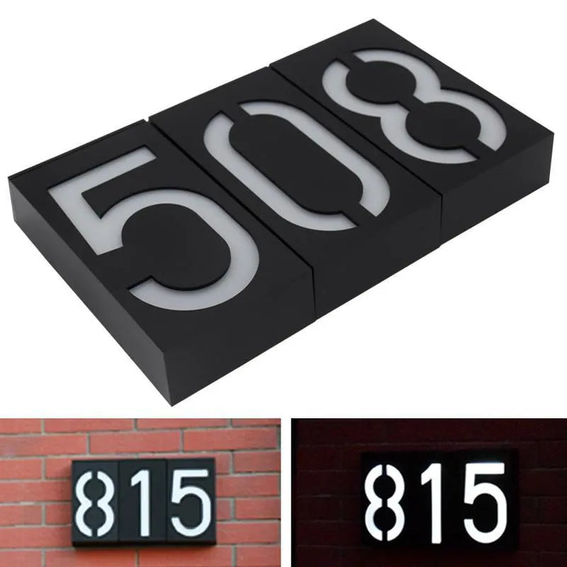 Solar powered outdoor house number light with white LEDs and weatherproof housing