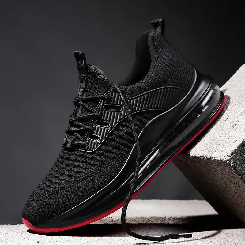 Men's solid colour mesh running sneakers with a round toe and lace-up front on a rubber sole.