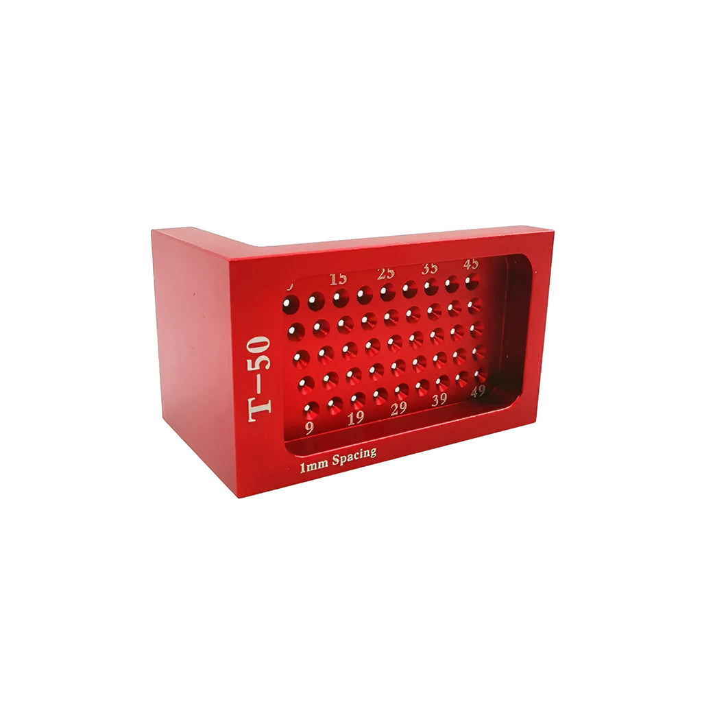 Red alloy steel T50 Mini Scribe woodworking ruler on a workbench for household marking