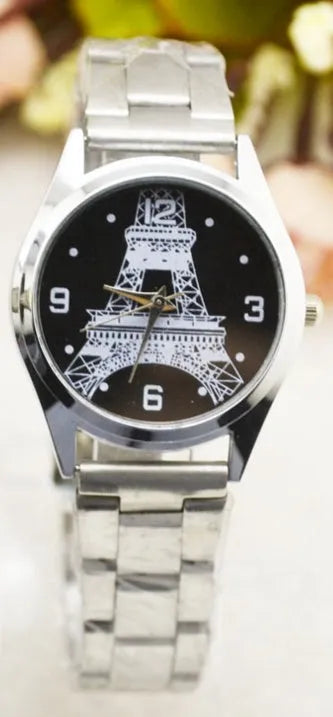 Eiffel Tower watch with black leather strap and stainless steel case showing detailed Paris skyline dial.