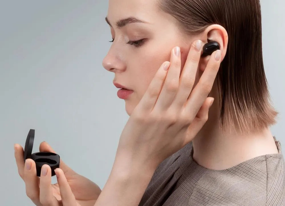 Redmi AirDots 2 true wireless black earbuds with a charging case.