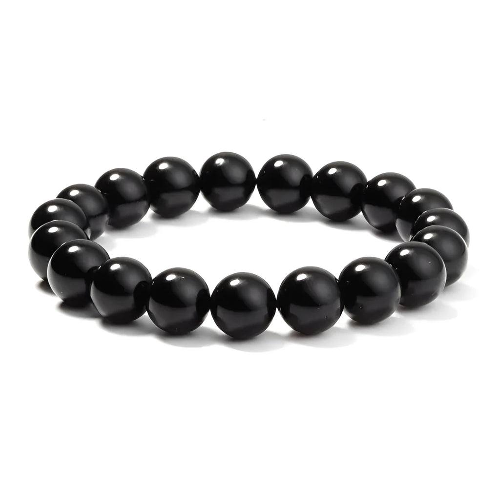Geometric black agate beaded bracelet with 8mm stones on a black elastic cord.
