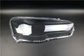 Transparent plastic headlight housing cover for vehicle lighting protection