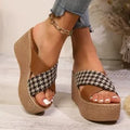 Cross leopard plaid wedge sandals in brown and black patterns with rubber sole and plastic upper