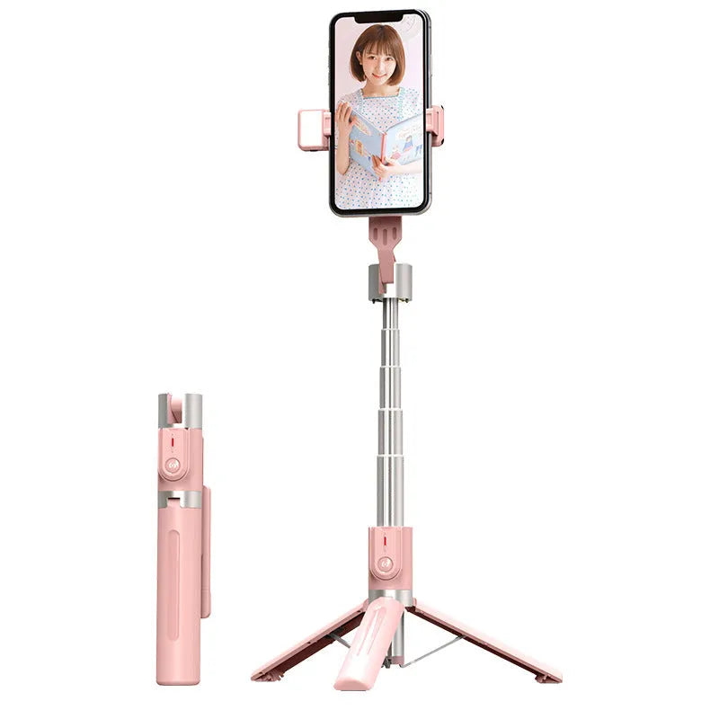 Bluetooth selfie stick with double fill light extended on desktop showing aluminium alloy arm and stand base