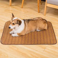 Brown rattan fibre dog cooling mat showing open-weave construction
