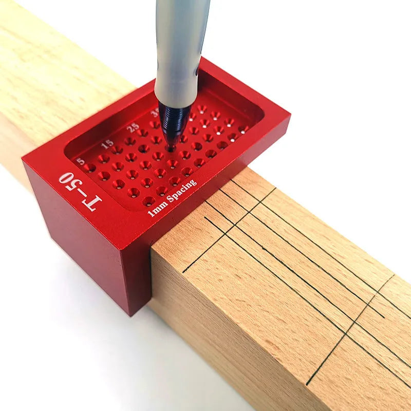 Red alloy steel T50 Mini Scribe woodworking ruler on a workbench for household marking