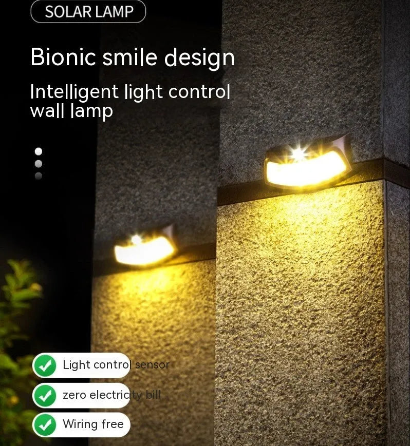 Solar-powered smiling face outdoor wall lamp for garden decoration