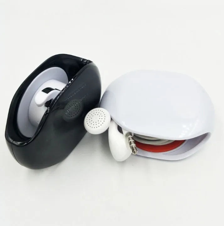 Automatic earphone cable retractor winder in a compact plastic storage box.