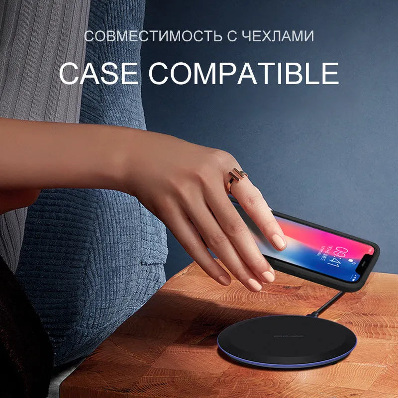 Black 10W 5W fast wireless phone charger on desk with slim 8mm profile