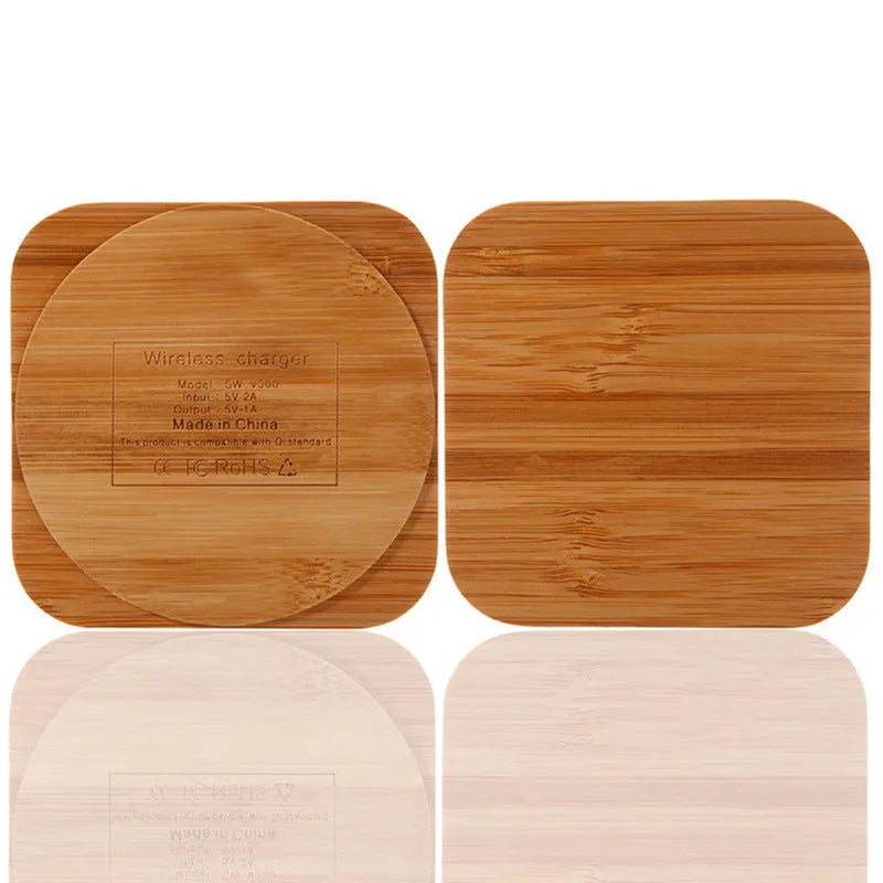 Square brown bamboo 5W wireless charging pad on a wooden table