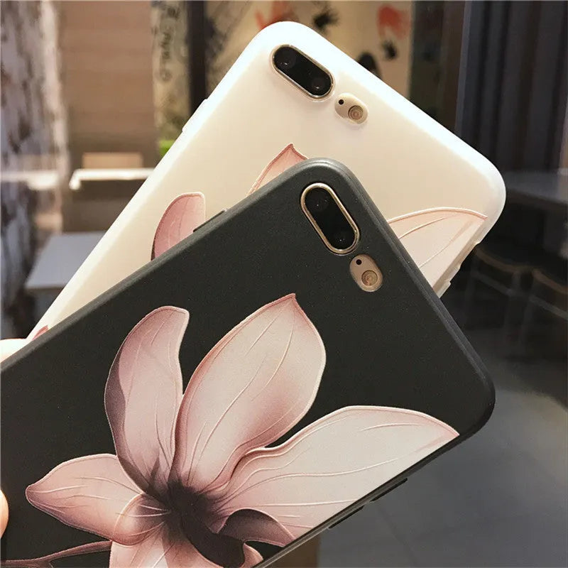 Embossed floral design on a black TPU iPhone case for iPhone 11.