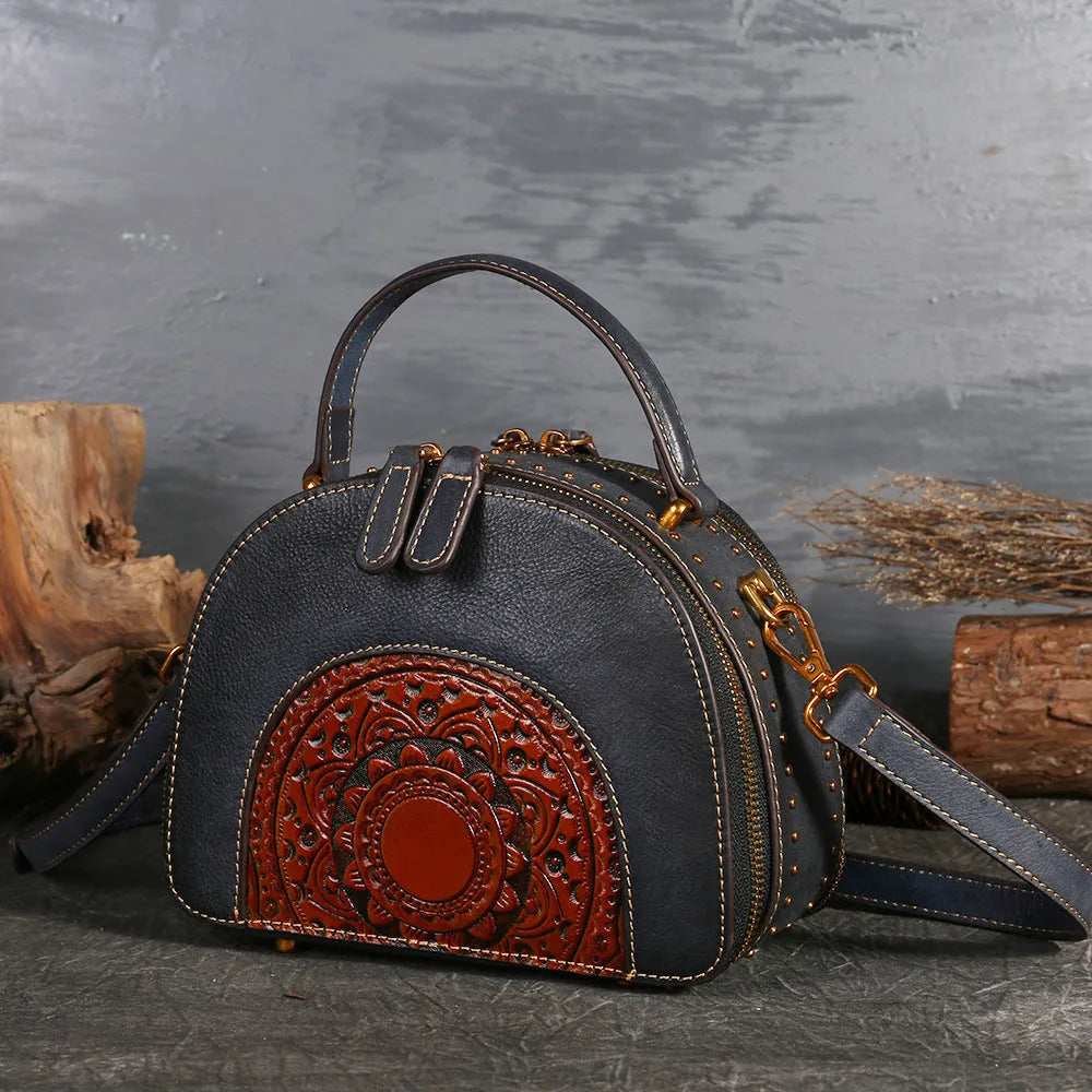 Vintage suede cowhide leather handbag showing internal ID pocket, phone pocket, and zipper compartments.