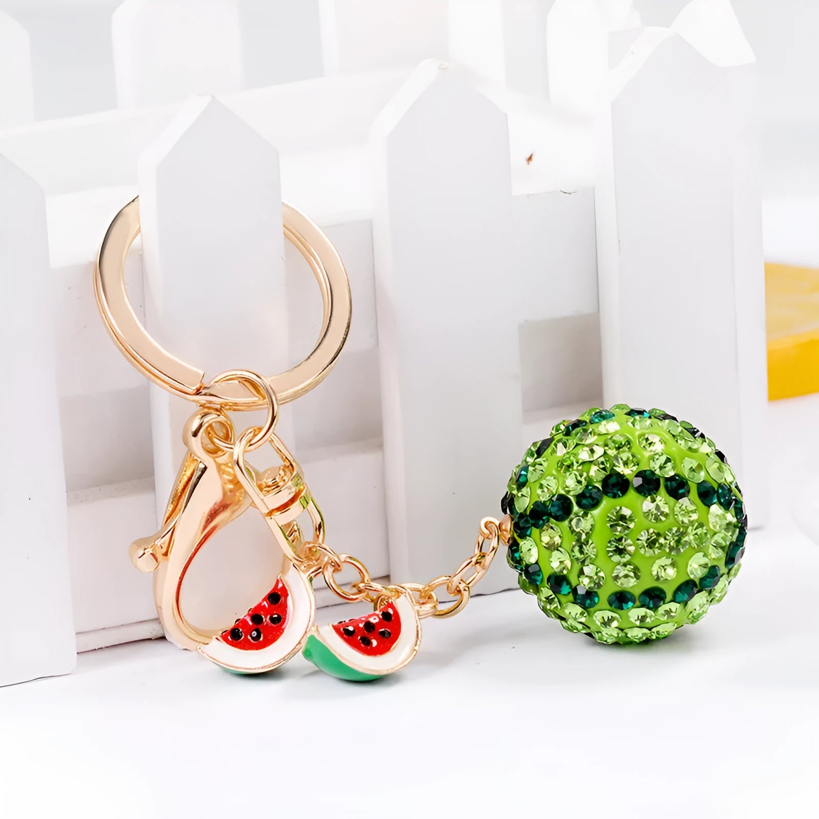 Green watermelon shaped metal keychain 12cm length with keyring attachment