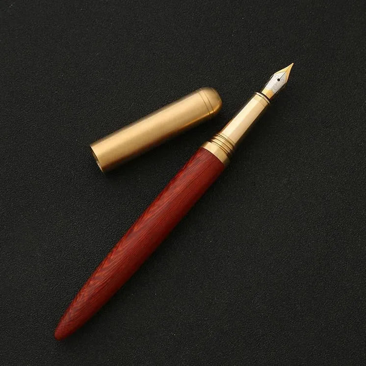 Business fountain pen with stainless steel nib and wooden body in rosewood finish on white background
