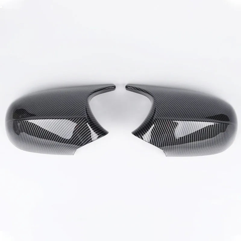 Pair of black ABS rearview mirror shells for BMW 3 Series E90, shown front and back.