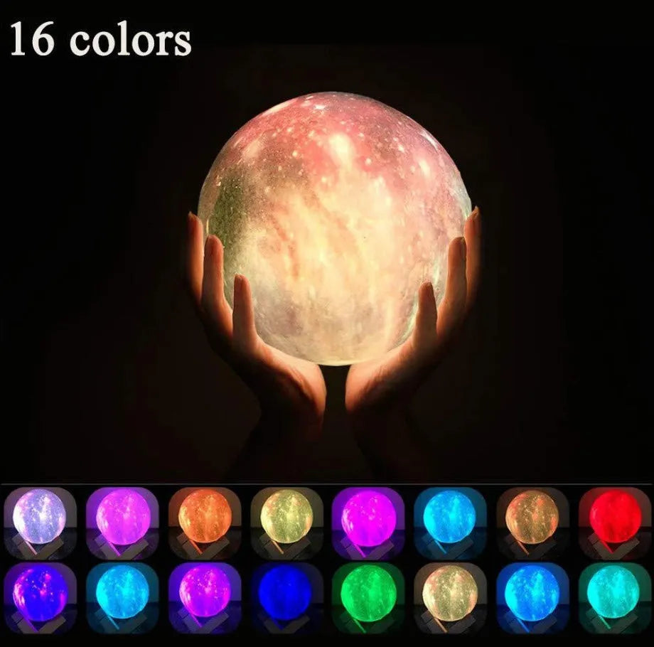 3D printed spherical lunar night light glowing with soft colour-changing LED light on a dark surface.