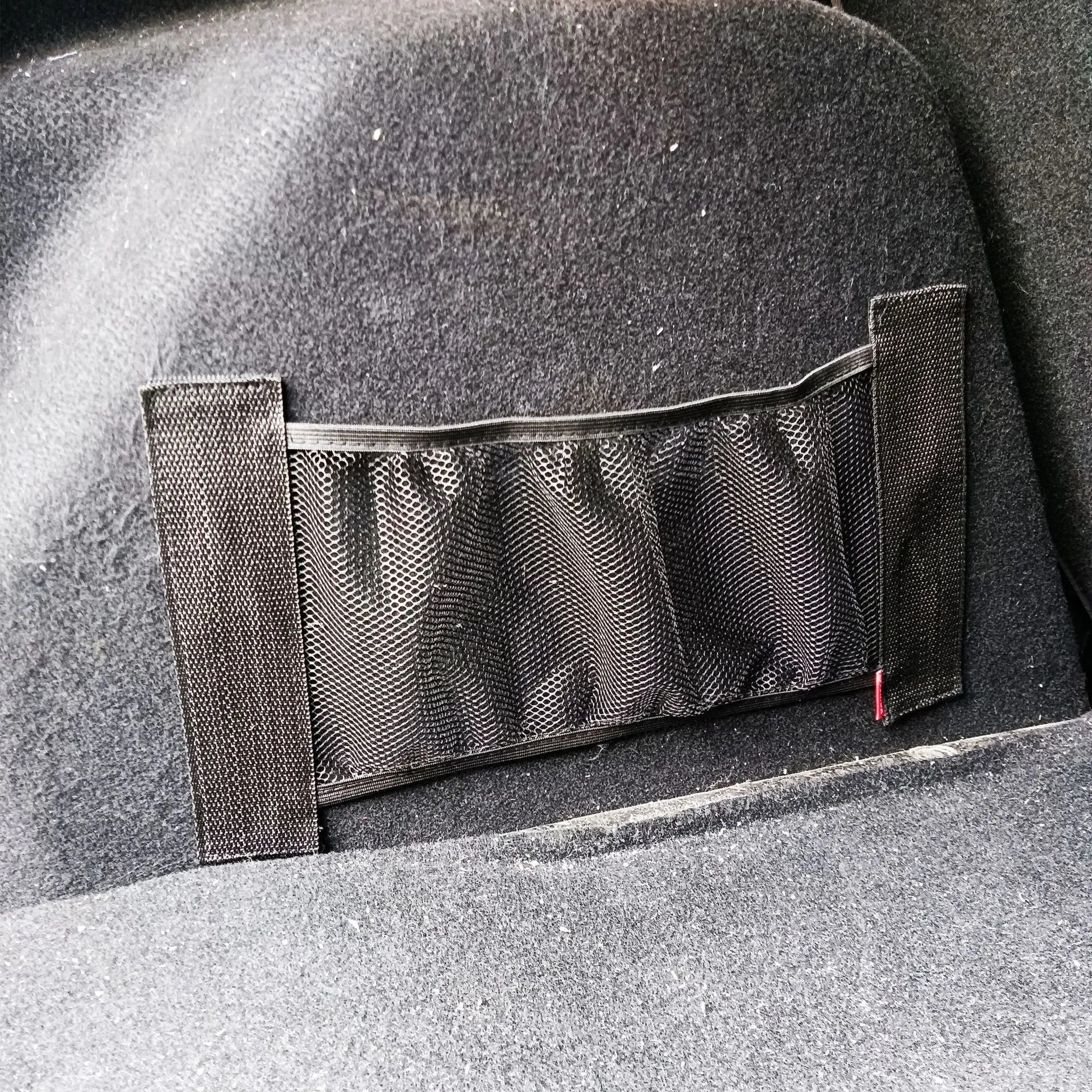 Polyester elastic storage net for car boot organisation in 20x35cm and 20x45cm sizes.