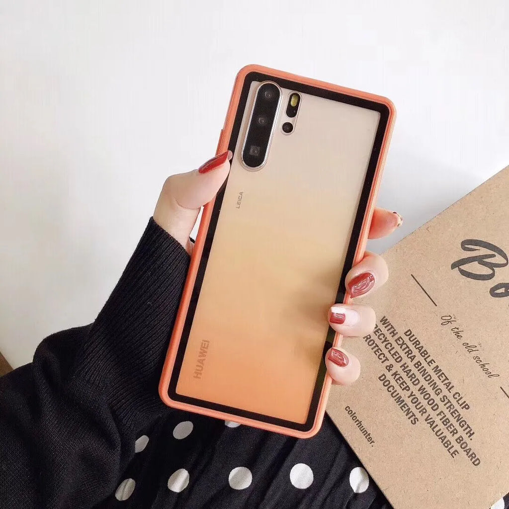 Rainbow coloured dual-material phone case for Huawei mobile phones, shown in black, green, orange and pink options.