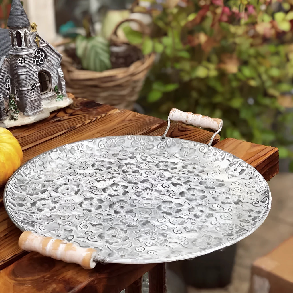 Round European-style wrought iron belt storage tray in two size options.